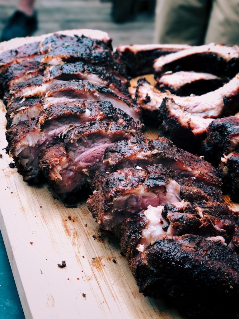 ribs on a wooden cutting board